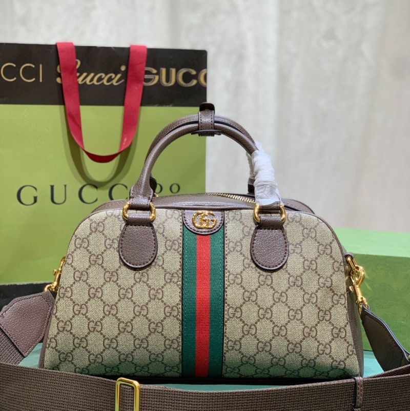 G*u*i top handle bags